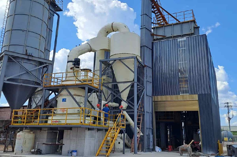 Raymond mill grinds and processes limestone into powder