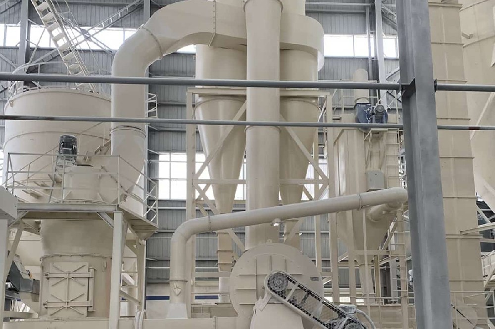 What kind of grinding mill is used for the production and processing of limestone powder?