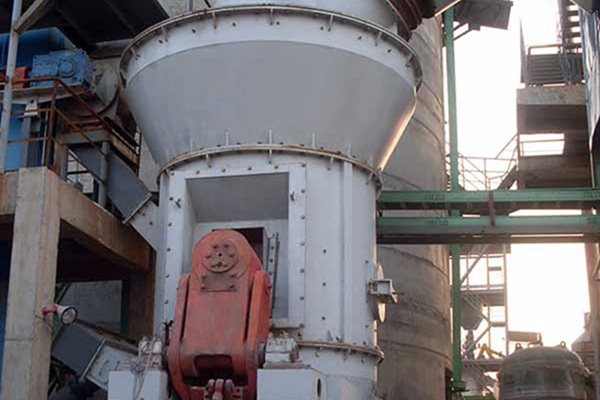 Vertical grinding mill processes calcium carbonate